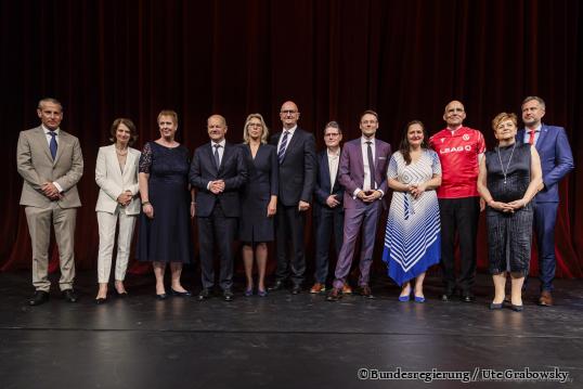 Bundeskanzler Scholz: „Wer hier anpacken will, ist uns herzlich willkommen.“